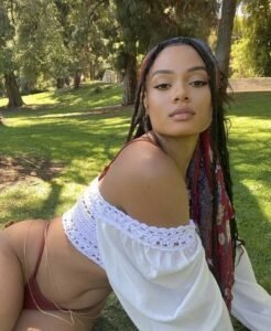 Sexy Caribbean woman outdoors in a lace top and thong – adult phone chat in Nottingham UK.