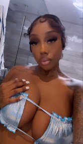 Busty Caribbean woman in metallic bikini top, seductive expression, long lashes and styled baby hair — Destiny Monroe, adult phone chat in Birmingham.