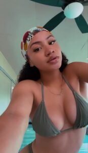 Busty Caribbean girl Zayla Heat teasing in bikini, offering adult phone chat in Birmingham UK
