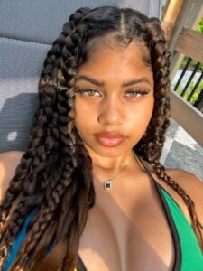 Leilani Blaze – Jamaican girl with braids posing for hot phone sex chat promotion in the UK