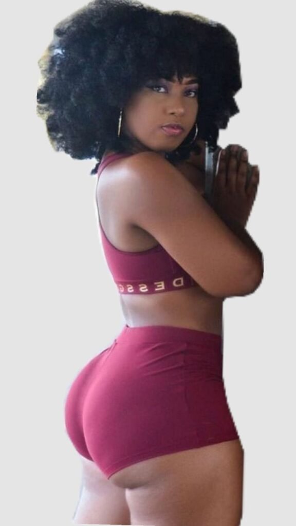 Nyla Blaze – Afro-Caribbean ebony phone sex girl in red shorts with natural afro