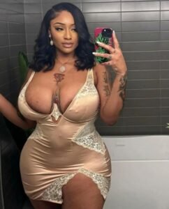 Vanessa Storm – BBW temptress in satin dress taking a mirror selfie