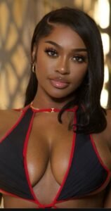 Caribbean goddess Jayla Noir in sultry black bikini for luxury adult phone chat in the UK