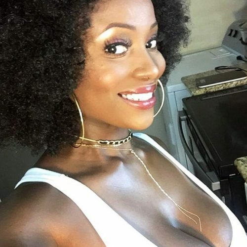 Amara Bliss – Ebony Caribbean phone sex girl in Manchester smiling seductively