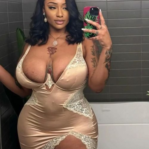 Vanessa Storm – BBW temptress in satin dress taking a mirror selfie